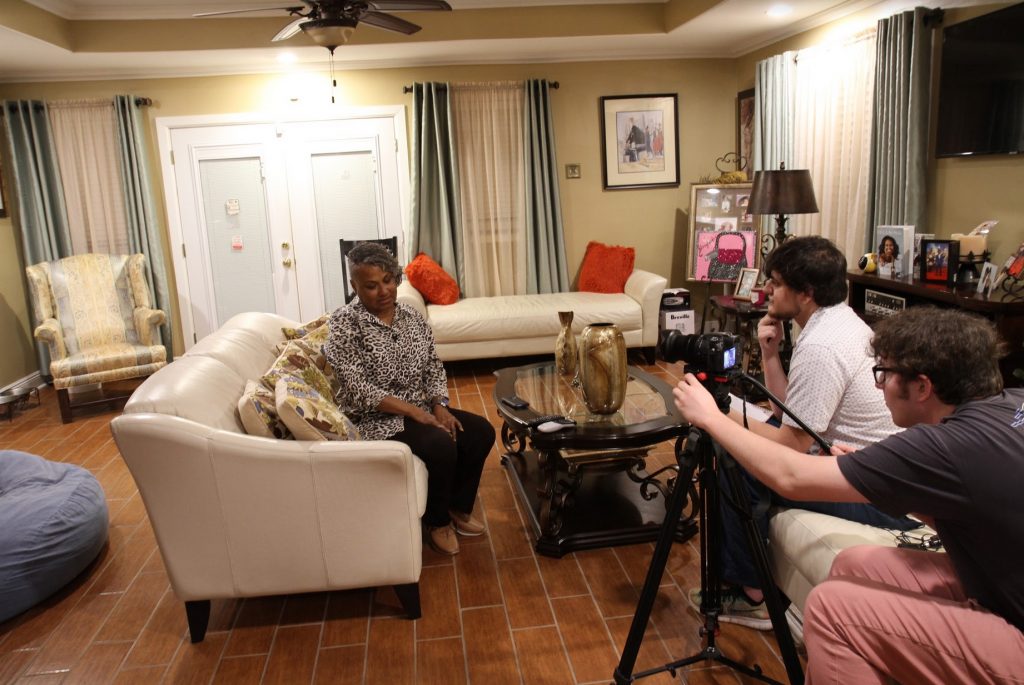 2019: Students interviewing Shannon Rainey, President, Gordon Plaza Resident Association, at home.